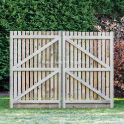 Wooden palisade driveway gate frame